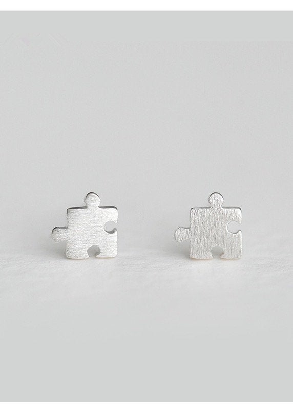 Tiny Puzzle Piece Stud Earring