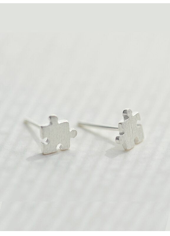 Tiny Puzzle Piece Stud Earring