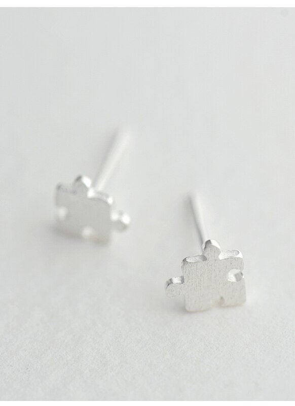 Tiny Puzzle Piece Stud Earring